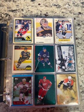 A full binder of NHL Hockey cards with inserts and rookies